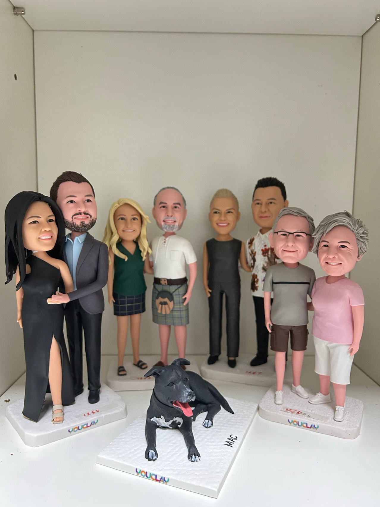 Fully Customizable                       Nine Bobbleheads(person or pet)Separate or whole