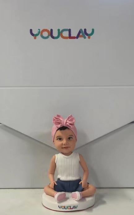 Figurine à tête branlante pour enfant entièrement personnalisable