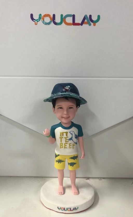 Figurine à tête branlante pour enfant entièrement personnalisable