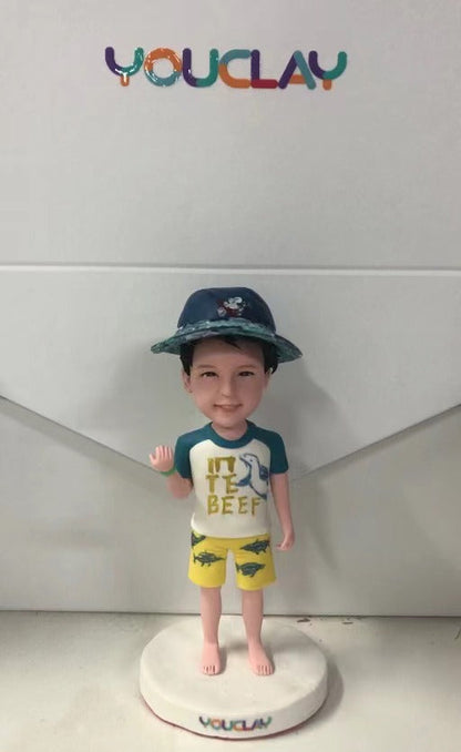 Figurine à tête branlante pour enfant entièrement personnalisable